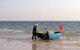 China: Boatman, Silver Beach (Beihai Yintan), Beihai, Guangxi Province