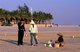 China: Shell vendors with a customer, Silver Beach (Beihai Yintan), Beihai, Guangxi Province